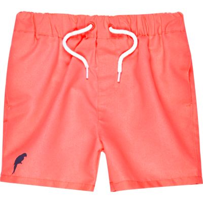 Mini boys pink swim shorts